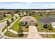 Charming single-story home with a well-manicured lawn and an attached two-car garage at 3260 Casa Del Rey Ave, Kissimmee, FL 34746