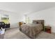 Large bedroom features soft carpeting, multiple windows and ample sunlight, offering comfort and convenience at 3260 Casa Del Rey Ave, Kissimmee, FL 34746