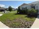 Lovely single-Gathering home with lush front yard, enhanced curb appeal, and an attached garage at 3260 Casa Del Rey Ave, Kissimmee, FL 34746