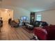 Spacious living area with views into the entryway at 3260 Casa Del Rey Ave, Kissimmee, FL 34746