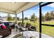 Relaxing screened patio with comfortable seating and tranquil outdoor view at 3260 Casa Del Rey Ave, Kissimmee, FL 34746