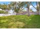 Spacious backyard with privacy fencing providing ample space for outdoor activities and relaxation at 33234 Kaylee Way, Leesburg, FL 34788