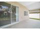 A covered patio with screen door provides access to the spacious backyard, offering relaxation and outdoor enjoyment at 33234 Kaylee Way, Leesburg, FL 34788