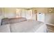 Bedroom with twin beds, white dresser, and easy access to the bathroom at 3460 Idlewood Loop, The Villages, FL 32162