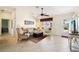 Inviting living room featuring tile floors, neutral furniture, and an open, airy feel at 3460 Idlewood Loop, The Villages, FL 32162