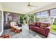 Sunroom featuring a ceiling fan and lots of natural light at 3460 Idlewood Loop, The Villages, FL 32162