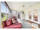 Bright sunroom with a ceiling fan and large windows at 3460 Idlewood Loop, The Villages, FL 32162
