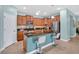 Spacious kitchen with an island, modern appliances, and ample storage space, perfect for cooking and entertaining at 3604 Corsica Ln, Clermont, FL 34711