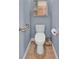 Powder room with a commode and grab bar at 3604 Corsica Ln, Clermont, FL 34711