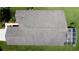 An aerial view of a home's roof, patio, and yard at 3716 Eversholt St, Clermont, FL 34711