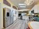 Spacious kitchen with stainless steel appliances, ample cabinet space, and adjacent breakfast nook at 3716 Eversholt St, Clermont, FL 34711