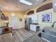 Bright kitchen featuring modern appliances, ample cabinet space, and eat-in dining area at 3716 Eversholt St, Clermont, FL 34711