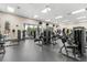 Fully-equipped gym with modern machines, weights and floor to ceiling windows at 4210 Arlington Ridge Blvd, Leesburg, FL 34748