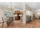 Kitchen with modern lighting, granite countertops, and a breakfast bar with seating at 4210 Arlington Ridge Blvd, Leesburg, FL 34748