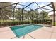 The screened pool provides a relaxing outdoor space at 4210 Arlington Ridge Blvd, Leesburg, FL 34748