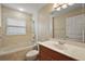 Bathroom with bathtub, shower, and a vanity with a sink at 5071 Harbour Dr, Oxford, FL 34484