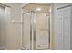 Bathroom with an enclosed glass shower stall at 5071 Harbour Dr, Oxford, FL 34484
