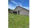 Spacious backyard featuring an attached screened in patio at 5268 Sw 110Th Pl, Ocala, FL 34476