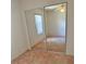A bedroom with mirrored closet doors and a window with natural light at 5268 Sw 110Th Pl, Ocala, FL 34476