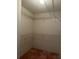 Walk-in closet with multiple wire shelves for organized storage at 5268 Sw 110Th Pl, Ocala, FL 34476