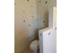 Compact toilet area with marine-themed decals at 5268 Sw 110Th Pl, Ocala, FL 34476