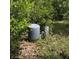Close up of the well and electrical box surrounded by trees and foliage at 5268 Sw 110Th Pl, Ocala, FL 34476