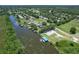 Aerial view of the community with water access at 6036 Topsail Rd, Lady Lake, FL 32159