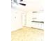 Kitchenette with white cabinets, granite counters, and modern appliances at 624 Australian Way, Davenport, FL 33897