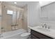 Well-lit bathroom featuring a shower-tub combination with a tiled surround at 6949 Minchew Cir, The Villages, FL 34762