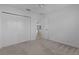 Bedroom featuring a ceiling fan and a large closet with paneled doors at 6949 Minchew Cir, The Villages, FL 34762