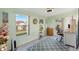 Bright office space featuring multiple windows and a cozy workspace at 714 Prado Dr, The Villages, FL 32159