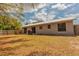 Spacious backyard with a privacy fence perfect for outdoor activities and entertaining at 7211 Se 120Th St, Belleview, FL 34420