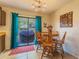 Eat-in kitchen or dining area featuring tile floors and sliding glass doors leading to the backyard at 7211 Se 120Th St, Belleview, FL 34420