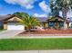 Charming single-story home with a two-car garage, well-maintained landscaping, and inviting curb appeal at 728 Silversmith Cir, Lake Mary, FL 32746
