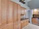 Kitchen with ample storage, sleek black countertops, and stainless steel appliances at 728 Silversmith Cir, Lake Mary, FL 32746