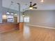 Living room and kitchen area with open floor plan and natural lighting at 728 Silversmith Cir, Lake Mary, FL 32746