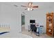 Comfortable bedroom with desk, and plenty of natural light, offering a pleasant and inviting atmosphere at 7901 Iceland Gull St, Winter Garden, FL 34787