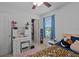 Inviting bedroom showcases a bed, a window, and direct access to a closet, enhancing convenience at 7901 Iceland Gull St, Winter Garden, FL 34787