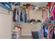 Organized walk-in closet featuring ample shelving and hanging space for efficient storage solutions at 7901 Iceland Gull St, Winter Garden, FL 34787