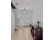 Inviting foyer boasting tile flooring, natural light, and a functional storage console at 7901 Iceland Gull St, Winter Garden, FL 34787