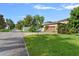 Well-maintained side yard featuring lush grass and a neatly trimmed lawn at 7901 Iceland Gull St, Winter Garden, FL 34787