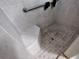 Tiled shower with seat and grab bar at 1007 Cr 463B, Lake Panasoffkee, FL 33538
