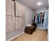 Spacious walk-in closet featuring built-in storage and ample hanging space for organized clothing at 1007 Cr 463B, Lake Panasoffkee, FL 33538