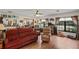 Spacious living room featuring laminate wood floors and lots of seating at 1048 Cr 452A, Lake Panasoffkee, FL 33538