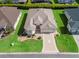 Beautiful aerial view of the property, showcasing the home's layout, landscaping, and surrounding neighborhood at 10927 Se 168Th Loop, Summerfield, FL 34491