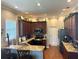 Spacious kitchen featuring granite countertops, dark cabinetry, and modern appliances at 12183 Se 178Th St, Summerfield, FL 34491