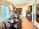 Kitchen featuring wood cabinets, granite countertops, and stainless steel appliances at 12183 Se 178Th St, Summerfield, FL 34491