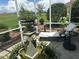 Screened in lanai features a water feature, seating, and lovely backyard views at 12183 Se 178Th St, Summerfield, FL 34491