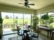 Enjoy your coffee with a view! This sunroom features beautiful views of the backyard at 12183 Se 178Th St, Summerfield, FL 34491