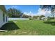 Large backyard with new vinyl fence and large grassy area at 12512 Draw Dr Dr, Grand Island, FL 32735